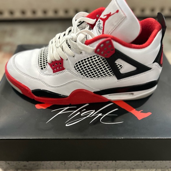 Nike Air Jordan 4 White and Red Sneakers